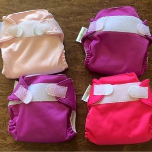 4 newborn xs bum genius good used condition cloth diapers